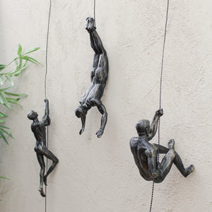 Set of Antique Bronze 'Abseiling' Wall Figures