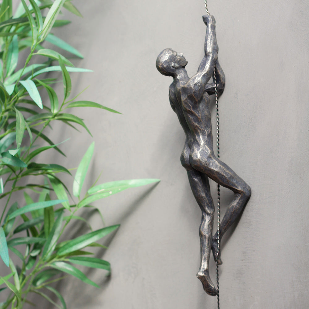 Antique Bronze 'Abseiling' Wall Figures